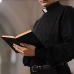 priest-inside-church-building